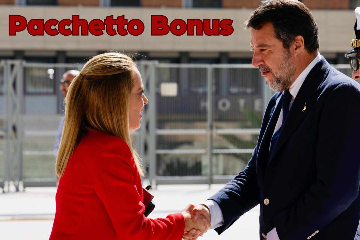 Meloni Salvini e scritta 