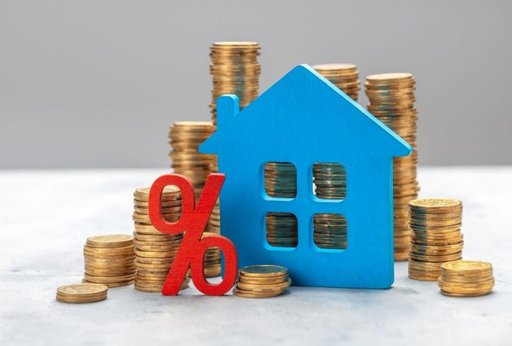 monete, figura casa e simbolo percentuale