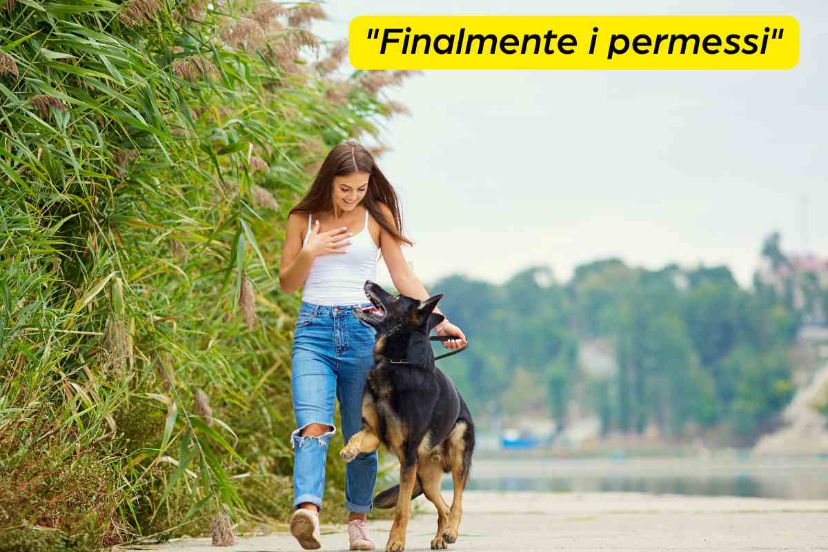 ragazza con cane e scritta 